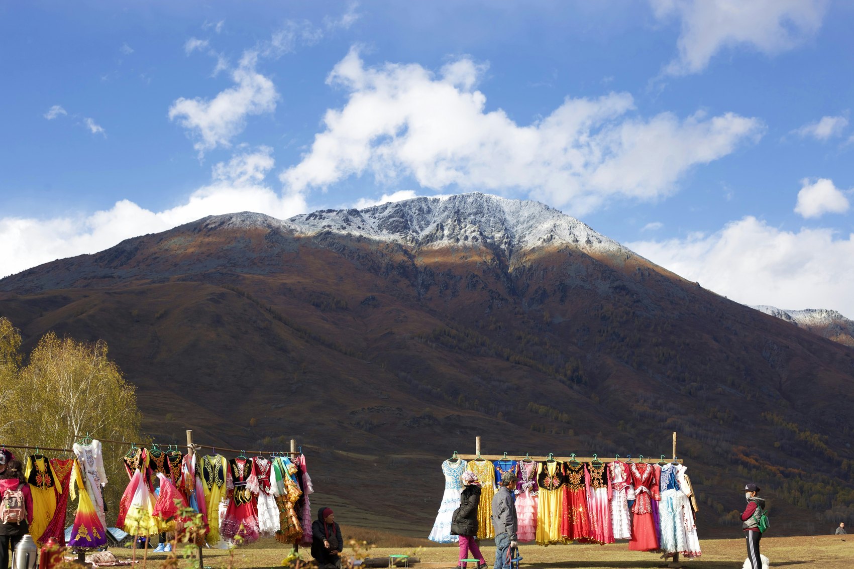 Mountain landscape and cultural gathering in Xinjiang